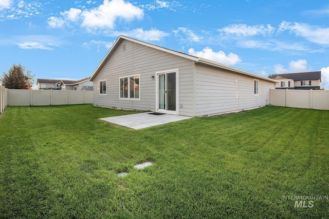 811 Pronghorn Dr, Twin Falls, ID 83301 - rear view of house featuring a patio area