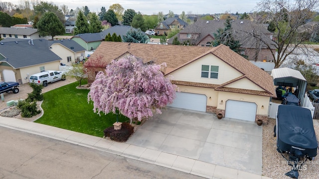 birds eye view of property featuring a residential view