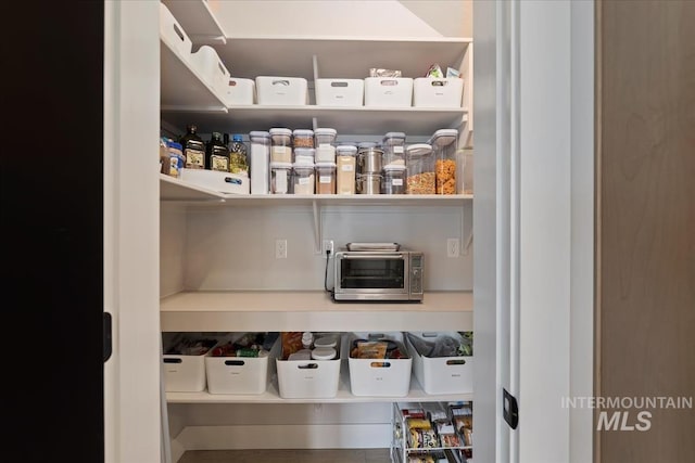 8749 W Suttle Lake Dr, Boise, ID 83714 - pantry featuring a toaster