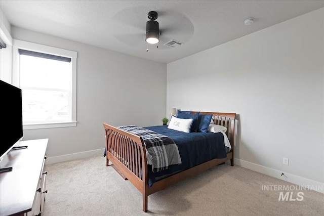 8749 W Suttle Lake Dr, Boise, ID 83714 - carpeted bedroom with visible vents, a ceiling fan, and baseboards