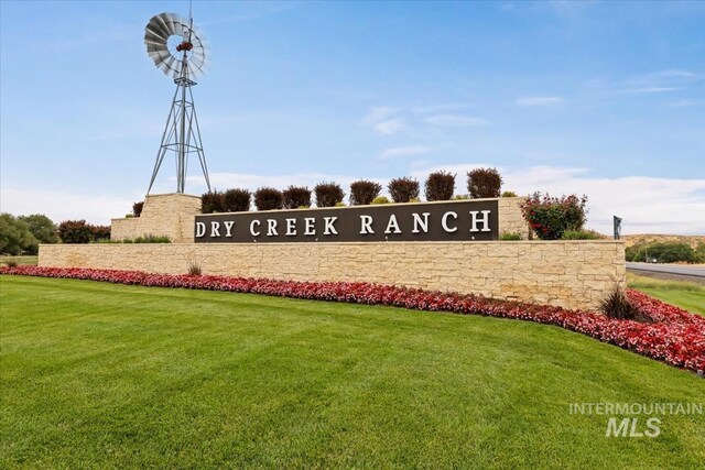 8749 W Suttle Lake Dr, Boise, ID 83714 - community / neighborhood sign featuring a lawn