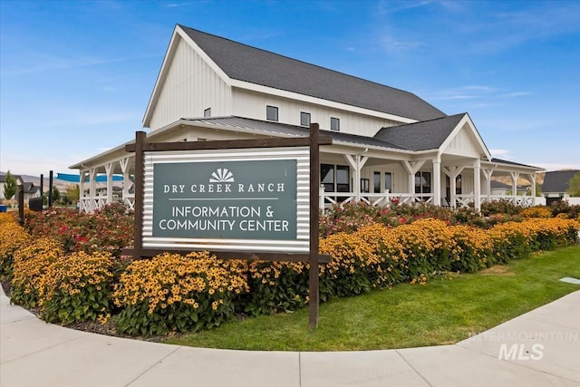 8749 W Suttle Lake Dr, Boise, ID 83714 - exterior space featuring a standing seam roof, board and batten siding, a shingled roof, and metal roof