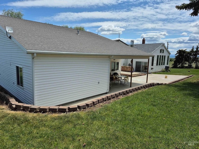 802 Foster Ave, Cottonwood, ID 83522 - rear view of house with a lawn, a patio, and a shingled roof