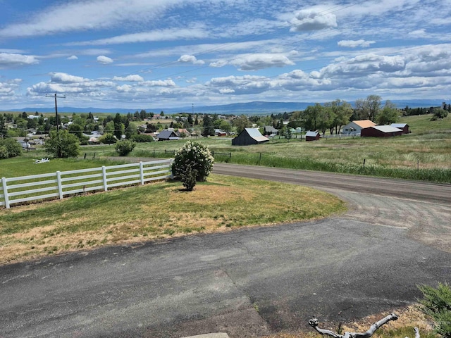 802 Foster Ave, Cottonwood, ID 83522 - view of asphalt street featuring a rural view