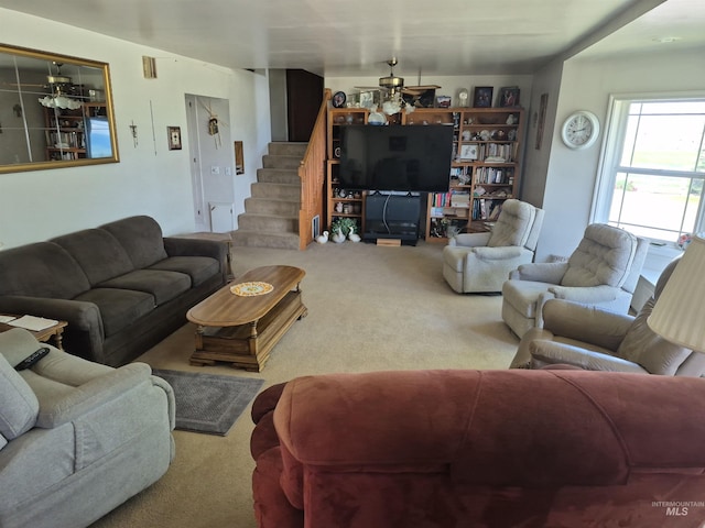 802 Foster Ave, Cottonwood, ID 83522 - carpeted living room with a ceiling fan and stairway