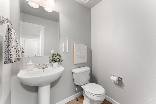 973 S Nautilus Ave, Boise, ID 83709 - bathroom with toilet and wood finished floors