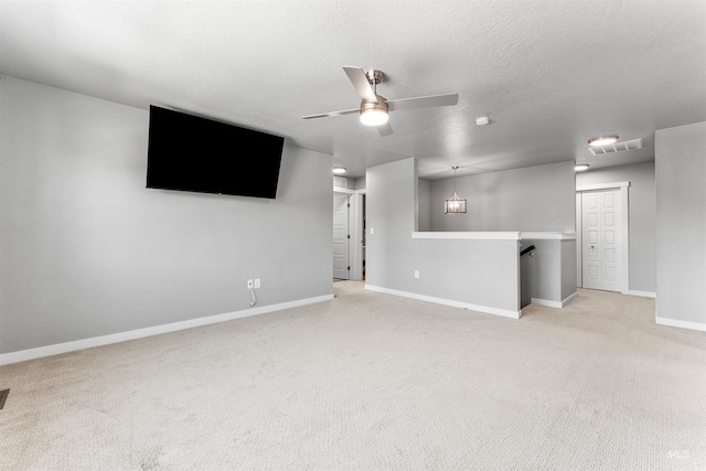 973 S Nautilus Ave, Boise, ID 83709 - unfurnished living room with ceiling fan and light carpet