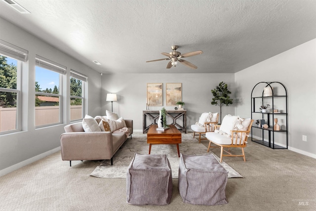 973 S Nautilus Ave, Boise, ID 83709 - living area with a textured ceiling, ceiling fan, and carpet