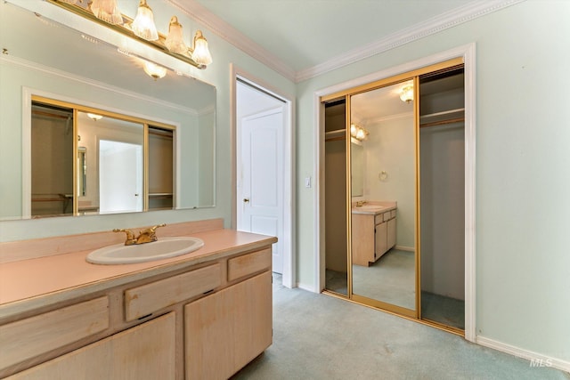 full bath featuring baseboards, ornamental molding, a closet, and vanity