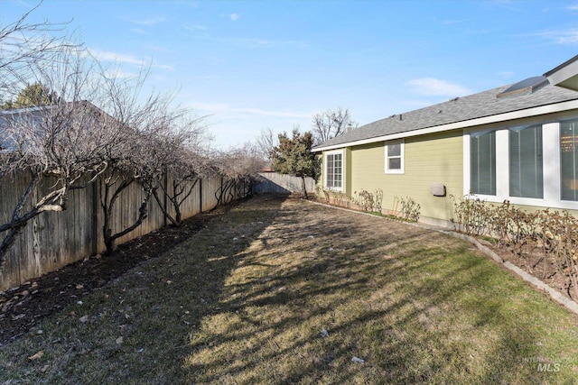 view of yard featuring a fenced backyard