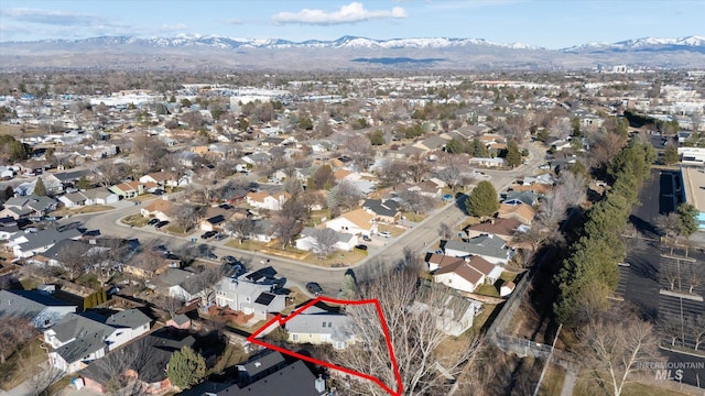 birds eye view of property featuring a residential view and a mountain view