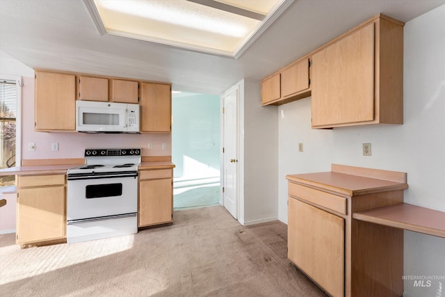 kitchen featuring light countertops, white appliances, light brown cabinets, and light carpet