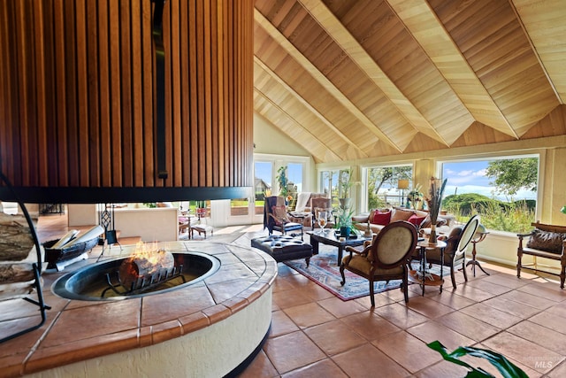 interior space with wooden ceiling and lofted ceiling with beams