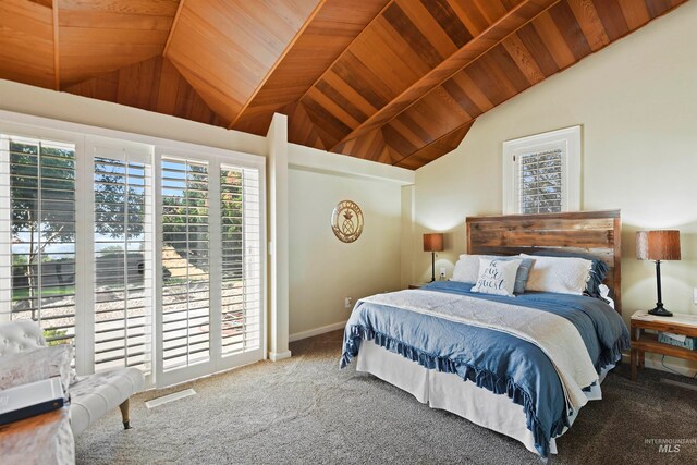 bedroom with carpet, wooden ceiling, and vaulted ceiling