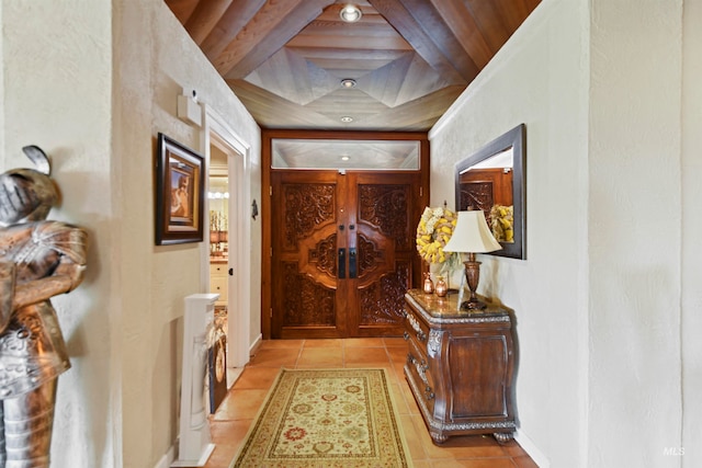 interior space featuring light tile patterned floors and wooden ceiling