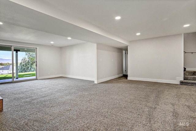 interior space with stairs, recessed lighting, carpet, and baseboards