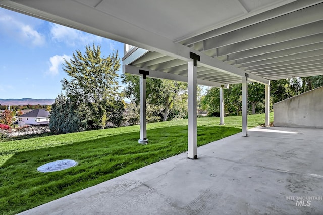 view of patio / terrace with a mountain view