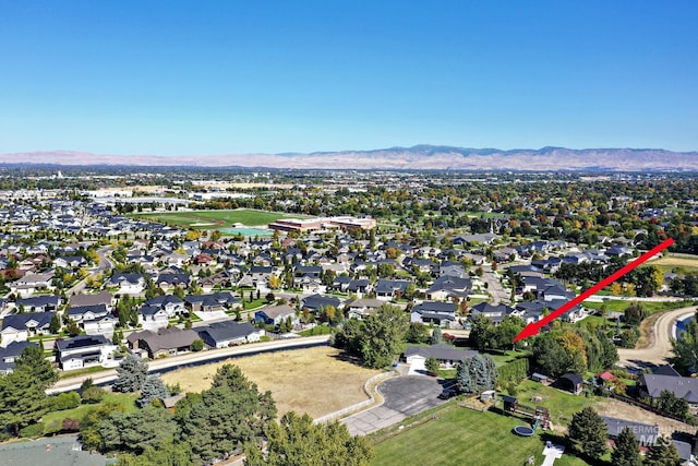 aerial view featuring a residential view and a mountain view