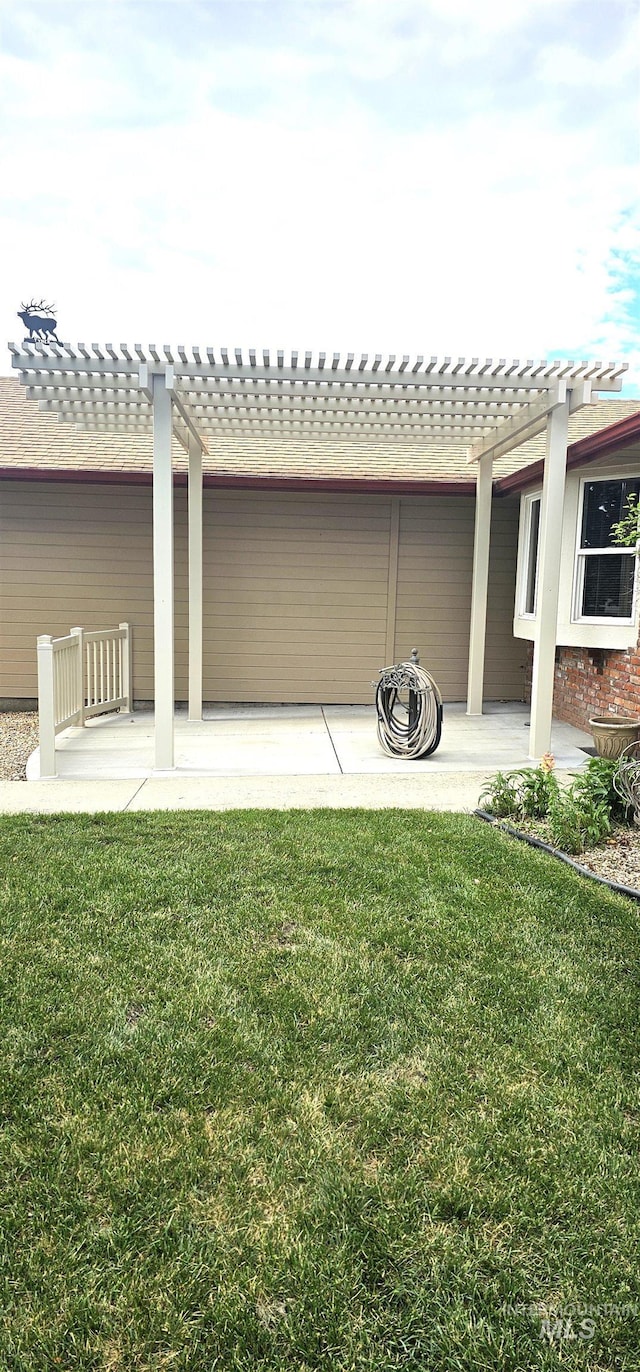 5720 N Oasis, Garden City, ID 83714 - rear view of house featuring a pergola, a lawn, and a patio
