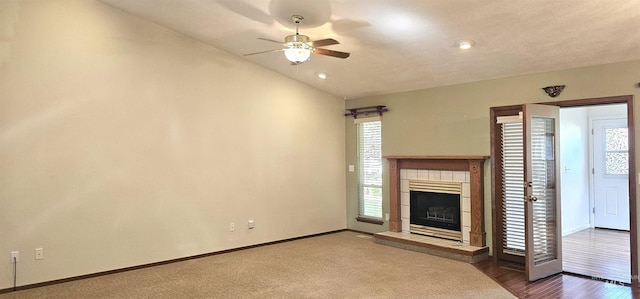 5720 N Oasis, Garden City, ID 83714 - unfurnished living room featuring a ceiling fan, baseboards, a fireplace, and lofted ceiling