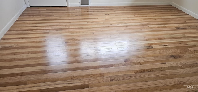 5720 N Oasis, Garden City, ID 83714 - detailed view of wood finished floors and baseboards