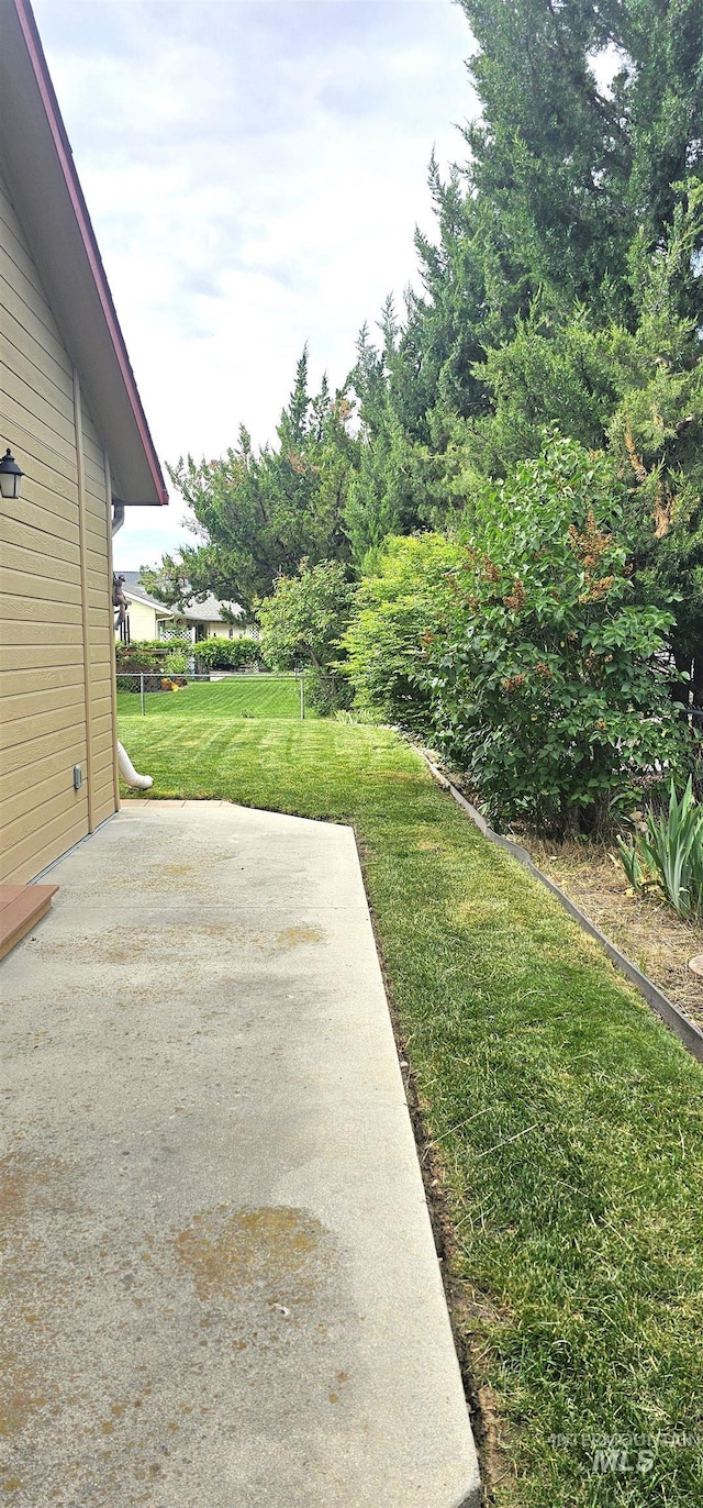 5720 N Oasis, Garden City, ID 83714 - view of green lawn featuring a patio