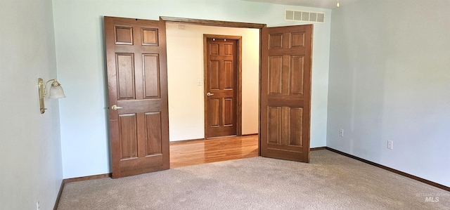 5720 N Oasis, Garden City, ID 83714 - unfurnished bedroom featuring carpet and baseboards