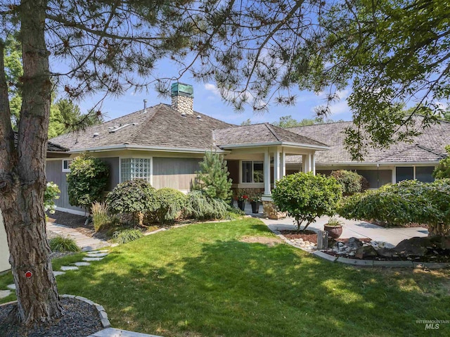 ranch-style house with a front yard