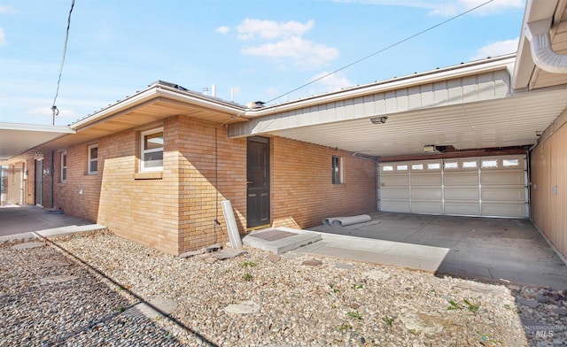 view of home's exterior with brick siding