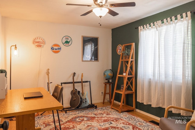 3929 N Shamrock Ave, Boise, ID 83713 - office space featuring a ceiling fan, wood finished floors, and baseboards