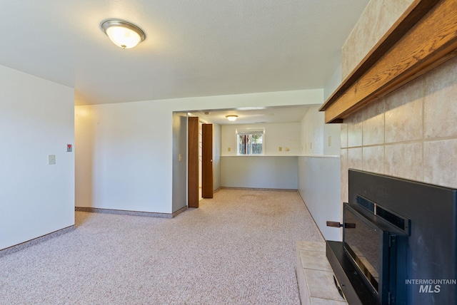 2045 11th Ave, Clarkston, WA 99403 - unfurnished living room with a fireplace, light colored carpet, and baseboards