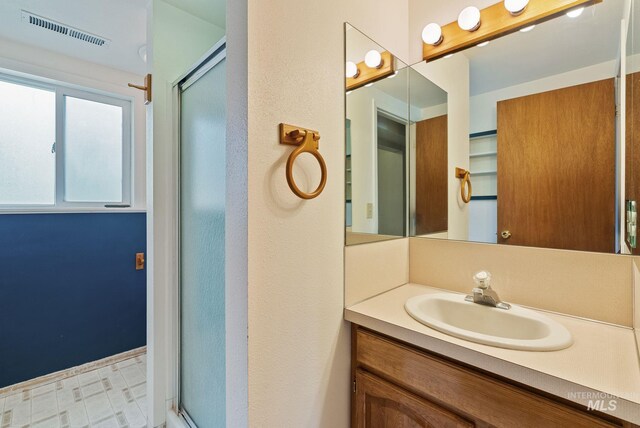 2045 11th Ave, Clarkston, WA 99403 - bathroom featuring vanity and an enclosed shower