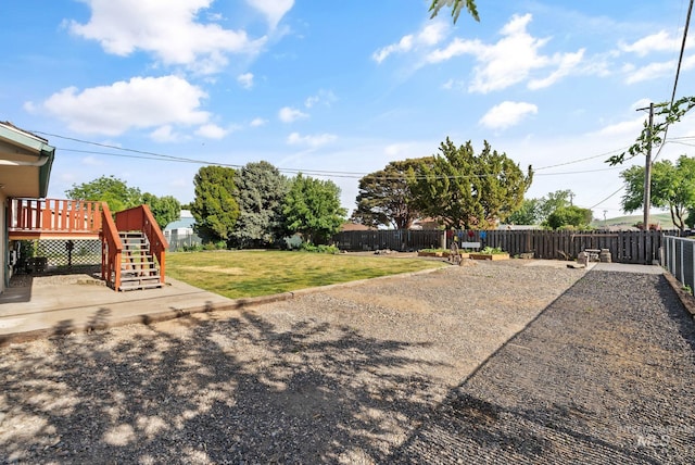 2045 11th Ave, Clarkston, WA 99403 - view of yard with stairway, a wooden deck, and a patio
