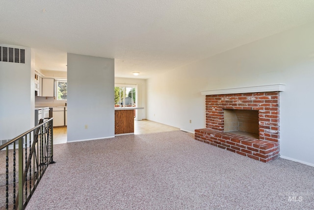 2045 11th Ave, Clarkston, WA 99403 - unfurnished living room with baseboards and a fireplace