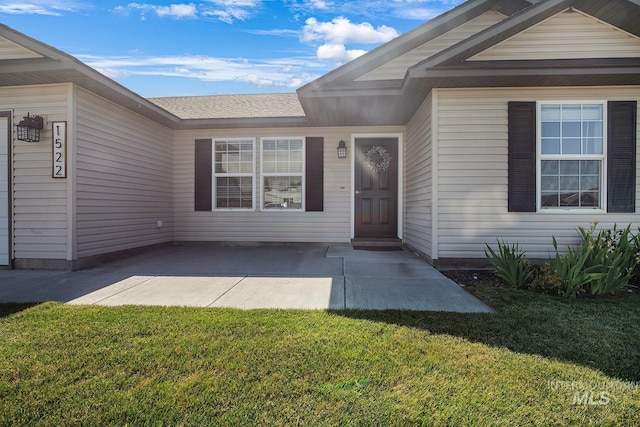 1522 Dana St, Twin Falls, ID 83301 - property entrance featuring a yard