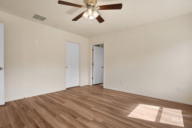1522 Dana St, Twin Falls, ID 83301 - unfurnished room with wood finished floors and a ceiling fan