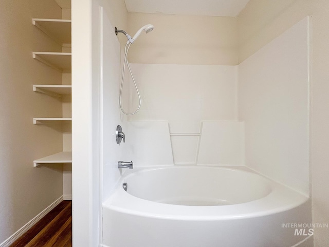 1522 Dana St, Twin Falls, ID 83301 - full bathroom featuring wood finished floors and bathtub / shower combination