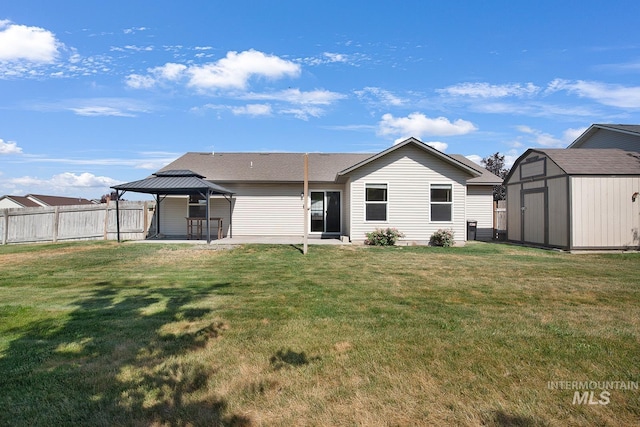 1522 Dana St, Twin Falls, ID 83301 - rear view of house featuring a gazebo, a storage unit, and a patio
