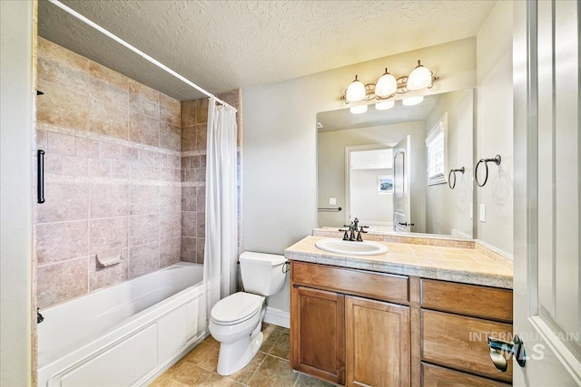 full bathroom with vanity, tile patterned flooring, toilet, shower / bathtub combination with curtain, and a textured ceiling