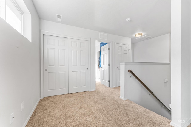 2318 Oxon St, Caldwell, ID 83605 - hall featuring an upstairs landing, carpet flooring, and baseboards