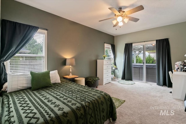 10450 W Antietam St, Boise, ID 83709 - bedroom with access to outside, a ceiling fan, and carpet floors