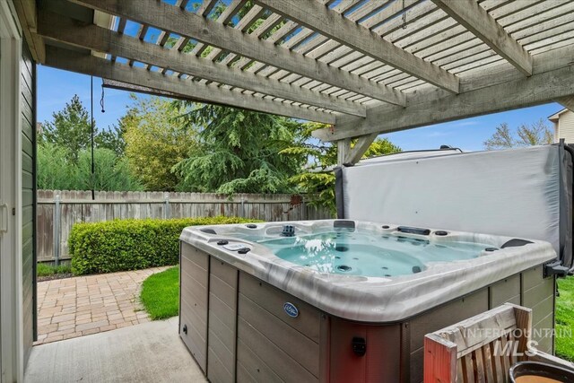 10450 W Antietam St, Boise, ID 83709 - view of patio with a hot tub and fence
