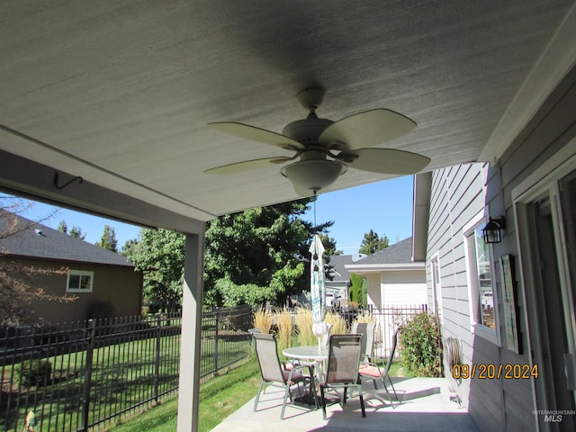 view of patio / terrace featuring ceiling fan