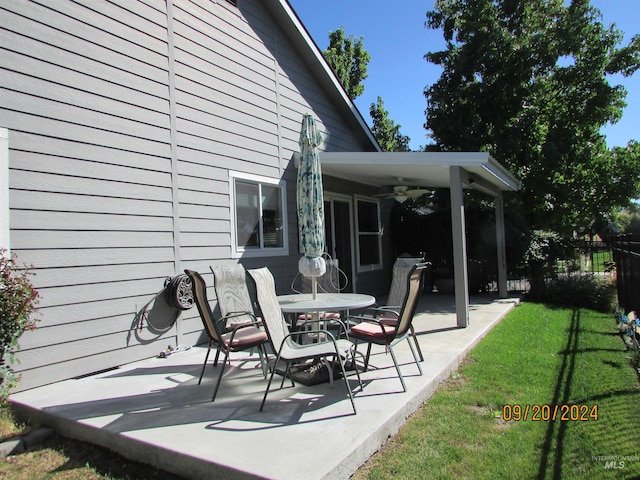 view of patio / terrace featuring ceiling fan