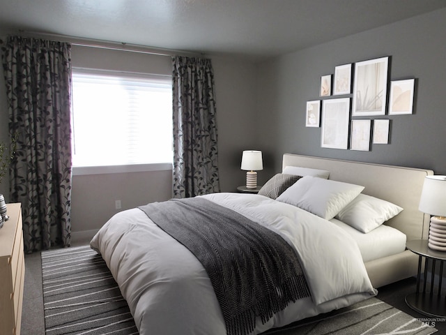 bedroom featuring carpet