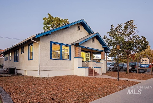 view of front of home with central air condition unit