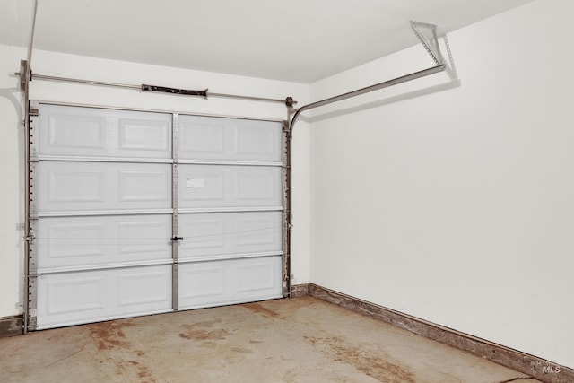 garage featuring baseboards