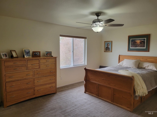 bedroom with baseboards and ceiling fan