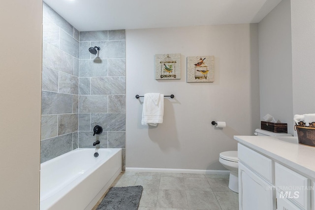 5696 N Kriscliffe, Boise, ID 83704 - full bath featuring vanity, toilet, baseboards, washtub / shower combination, and tile patterned flooring