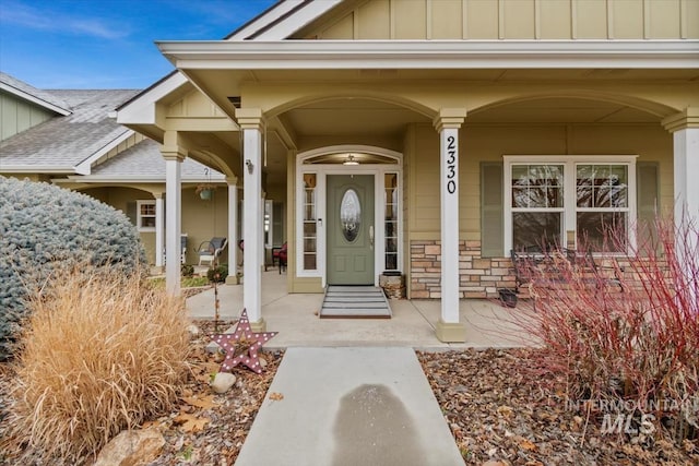 entrance to property with a porch